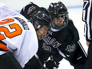 Kelly Zajac (Union - 19) faces off with Will MacDonald (Princeton - 22). Zajac had a 4 point game as the Union College Dutchman visited Hobey Baker Rink in Princeton, NJ, defeating Princeton 7-4. (Shelley M. Szwast)