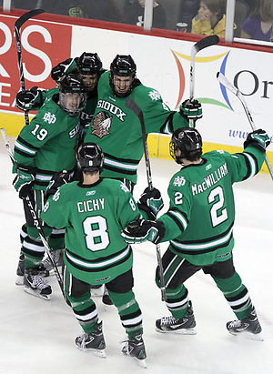 North Dakota celebrates Matt Frattin's goal in the third period. No. 8 North Dakota used a three-goal third period to beat No. 4 UNO 6-5 Friday night at Qwest Center Omaha. (Photo by Michelle Bishop) (Michelle Bishop)