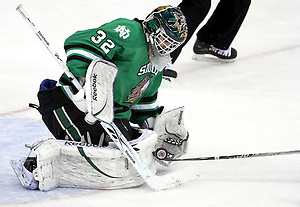 North Dakota goalie Aaron Dell stops a shot during the third period. No. 4 UNO beat No. 7 North Dakota 1-0 Saturday night at Qwest Center Omaha. (Photo by Michelle Bishop) (Michelle Bishop)