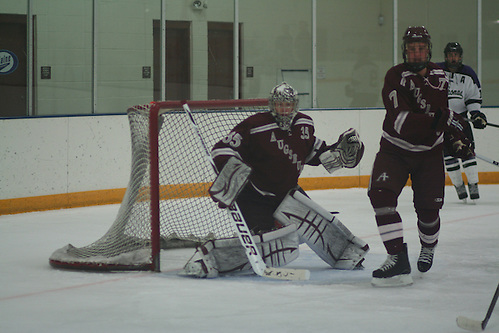 Justin Lochner and defenseman Daniel Hildebrandt (Don Stoner)