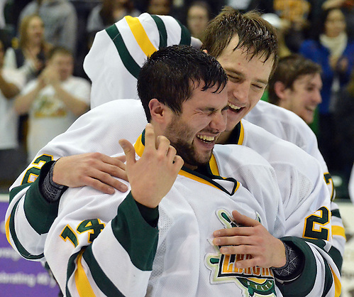 Paul Rodrigues and Kyle Badham of Oswego (Dan Hickling)