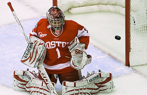 Kerrin Sperry deflects a shot in the first period of the 2013 NCAA Women's Frozen Four Championship game at Ridder Arena in Minneapolis on March 24, 2013.. (Ryan Coleman/Ryan Coleman, USCHO.com)