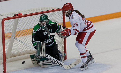 (Erika Sowchuk-25 Wisconsin) (Shelby Amsley-Benzie-1 North Dakota )08 March 13  University of North Dakota and Wisconsin in the  WCHA Final Face Off (BRADLEY K. OLSON)