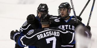 Andrew McDonald (Bentley - 13) and Tyler Deresky (Bentley - 11) celebrate Deresky