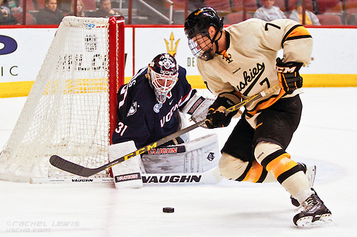 2016Jan08:  Rob Nichols (UConn - 31), Reid Sturos (Mich Tech - 7)  Game 1 of the Desert Hockey Classic has two Husky teams facing off against one another, UConn and Michigan Tech. (©Rachel Lewis)