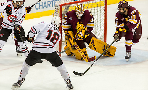 Judd Peterson (SCSU-18) Hunter Miska (Minnesota-Duluth-35) 16 November 05 University of Minnesota Duluth and St. Cloud State University  meet in a NCHC conference contest at Herb Brooks National Hockey Center (Bradley K. Olson)