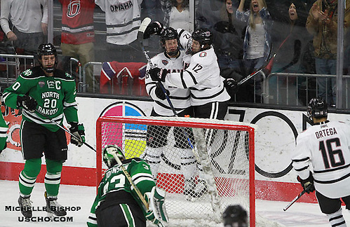 Omaha celebrates David Pope's (12) goal during the third period. North Dakota beat Omaha 7-3 Saturday night at Baxter Arena. (Photo by Michelle Bishop) (Michelle Bishop)