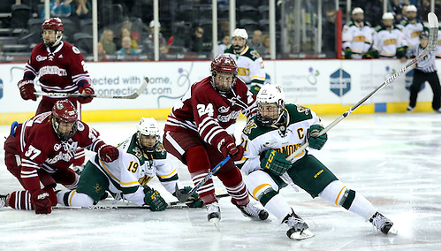 Press Eye - Belfast -  Northern Ireland - 25th November 2016 - Photo by William Cherry Vermont Catamounts' Mario Puskarich with UMass Minutemen's Shane Bear during Friday afternoons Friendship Four game at the SSE Arena, Belfast.  Four teams from the USA are competing in the NCAA mens ice-hockey tournament in the hope of winning the Belpot Trophy. Photo William Cherry/Presseye (©William Cherry / Presseye)