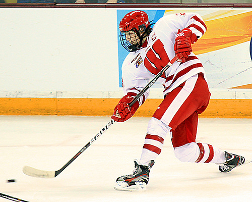 Wisconsin's Hilary Knight fires a slapshot during the NCAA Frozen Four Championship Game in Duluth Sunday afternoon. (2012 Dave Harwig)