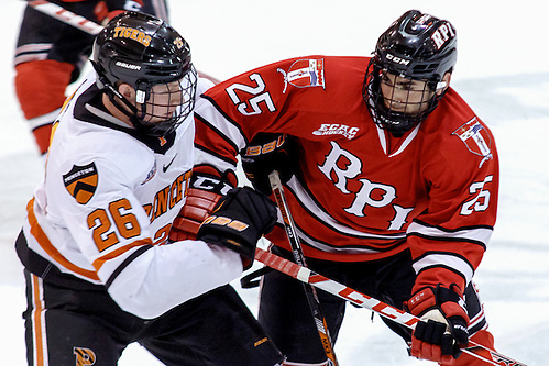 Ryan Siiro (Princeton - 26) and Drew Melanson (Rensselaer - 25) battle at center ice. (Shelley M. Szwast)