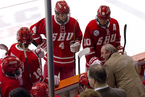 Sacred Heart Head Coach CJ Marottolo (Northeastern '89) talks to his players during a time out. (Shelley M. Szwast)