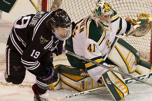 8 Jan 16: Brad McClure (Minnesota State - 19), Ate Tolvanen (Northern Michigan - 41). The Minnesota State University Mavericks host the Northern Michigan University Wildcats in a WCHA conference matchup at Verizon Wireless Center in Mankato, MN. (Jim Rosvold)