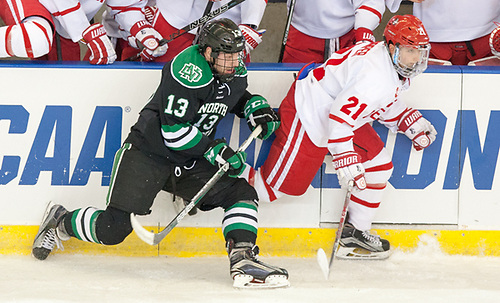 Mike Gornall (North Dakota-13) Patrick Harper (Boston University-21) 24 March 17 University of North Dakota and  Boston University  meet in the NCAA West Region at Scheels Arena Fargo, ND (Bradley K. Olson)