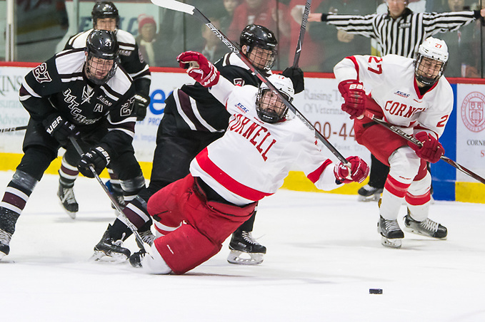 Anthony Angello (17 - Cornell) is tripped up in the Union zone (2018 Omar Phillips)