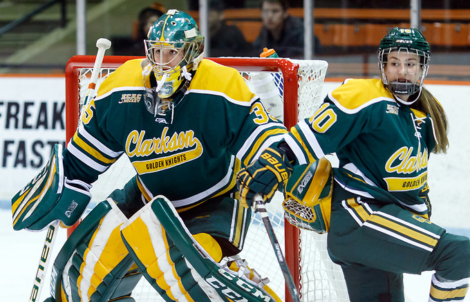 Shea Tiley (Clarkson - 35) and Michaela Pejzlova (Clarkson - 10) defend the net. ((c) Shelley M. Szwast 2016)