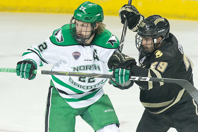 Rhett Gardner (North Dakota-22) Colt Conrad (Western Michigan-29) 2018 November 17 The University of North Dakota hosts Western Michigan in a NCHC matchup at the Ralph Engelstad Arena in Grand Forks, ND (Bradley K. Olson)