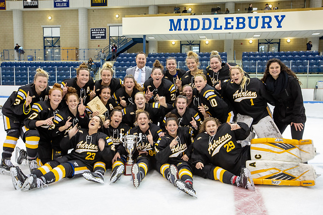 Adrian celebrates winning the Panther/Cardinal Classic (Adrian Athletics)