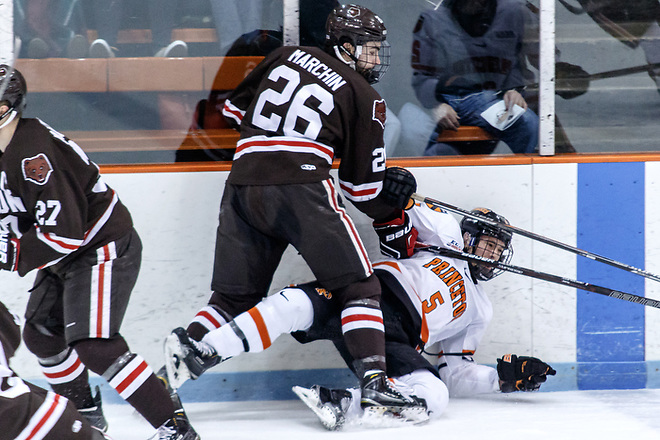 Tommy Marchin (Brown -26) checks Hayden Anderson (Princeton - 5). (Shelley M. Szwast)