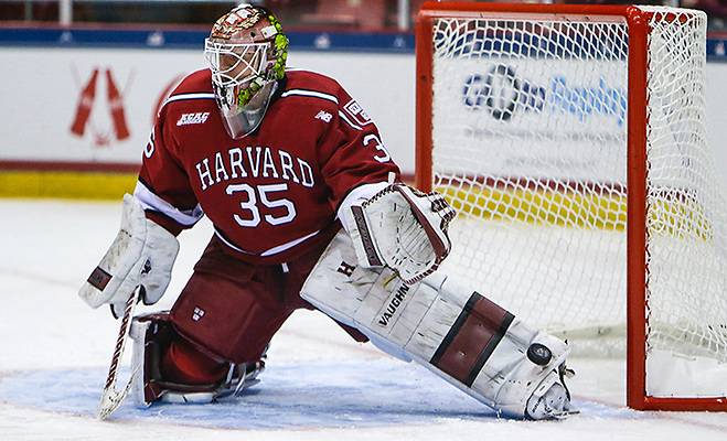 March 19, 2016: Harvard Crimson goalie Michael Lackey (35) takes shots during warmups prior to the 2016 ECAC Tournament Championship game between Harvard University and Quinnipiac University at Herb Brooks Arena in Lake Placid, NY. (John Crouch/J. Alexander Imaging)