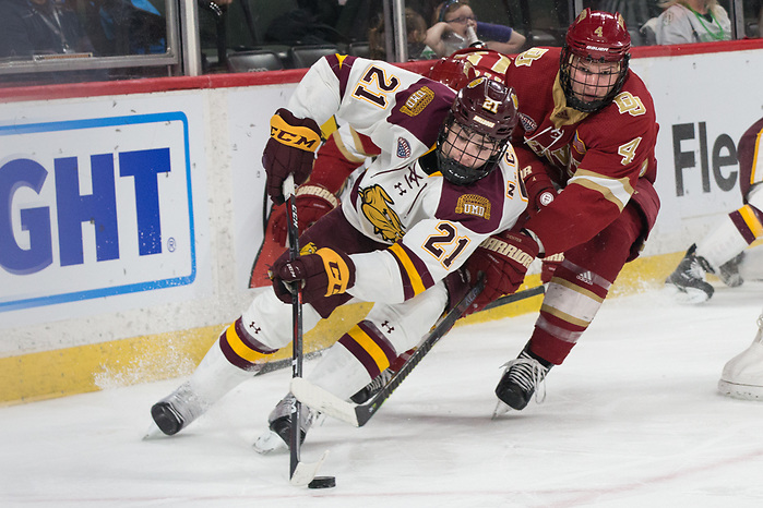 Noah Cates (University of Minnesota Duluth -21 ) Griffin Mendel (Denver-4) 2019 March 22 Denver and University of Minnesota Duluth meet in the semi finals of the NCHC  Frozen Face Off at the Xcel Energy Center in St. Paul, MN (Bradley K. Olson)