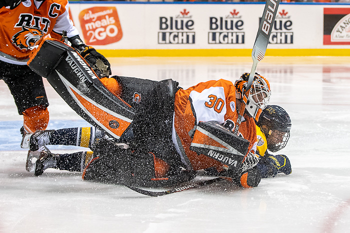 Hugo Esselin (15 - Merrimack) collides with Logan Drackett (30 - RIT) (Omar Phillips 2019)