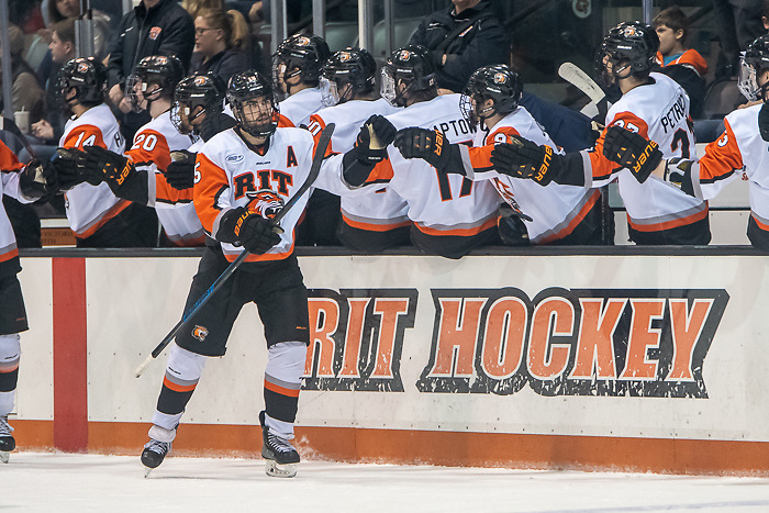 Shawn Cameron (15 - RIT) celebrates a third period goal (2020 Omar Phillips)