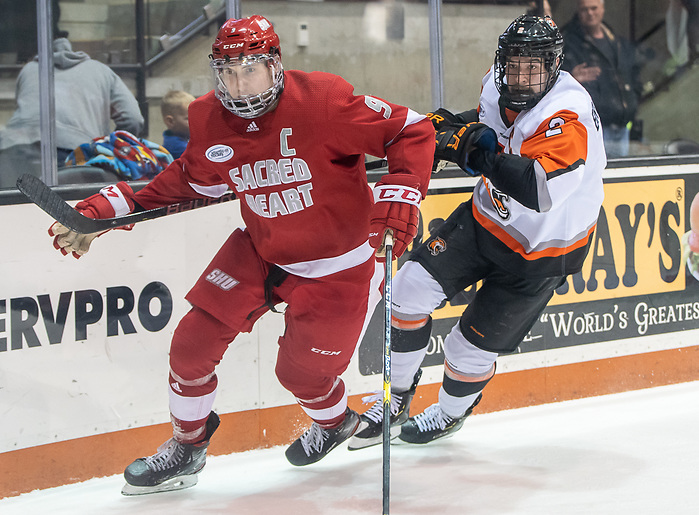 Jason Cotton (9 - Sacred Heart), Adam Brubacher (2 - RIT) (2019 Omar Phillips)